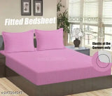 Pink Glace Cotton striped elastic double bedsheet with two pillow covers, ideal for summer adult use, displayed on a bed