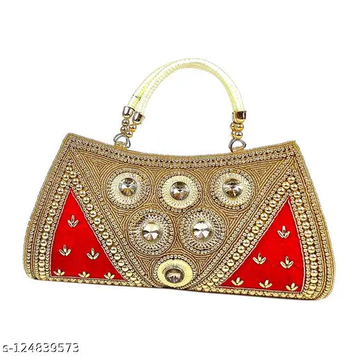 Gold purse with embroidery and red triangular insets, possibly a bridal accessory