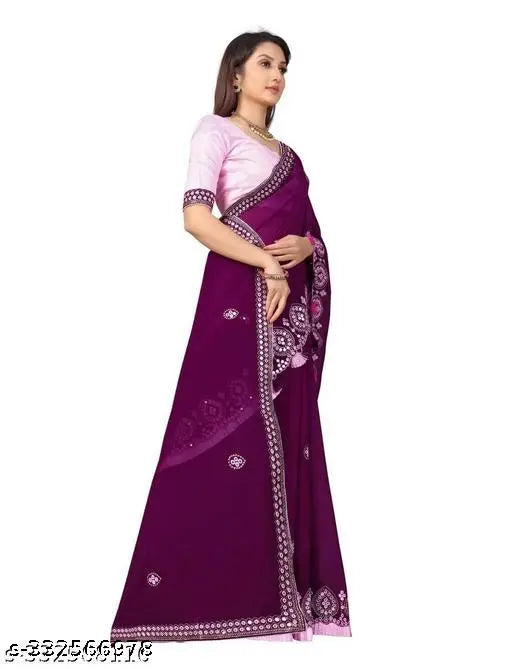 Vibrant royal purple saree with intricate silver sequence embroidery, frilled borders and tassels