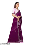 Vibrant royal purple saree with intricate silver sequence embroidery, frilled borders and tassels