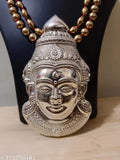Metal Laxmi idol, ornate Laxmi mukuta, intricate Laxmi Pooja face for traditional Hindu worship