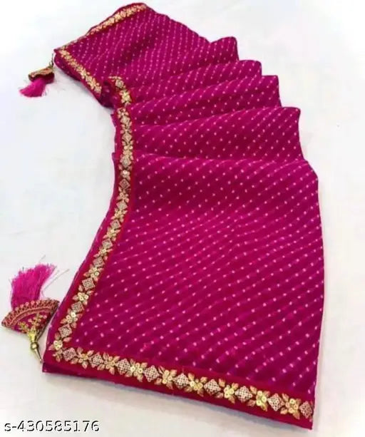 Georgette pink bandhani saree with pink borders and tassel