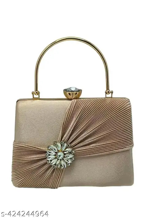 Beige and gold embellished clutch purse with clear bow accent