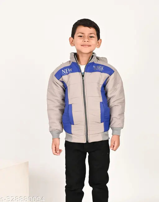A child wearing a multicolored reversible winter jacket with a full-length zipper