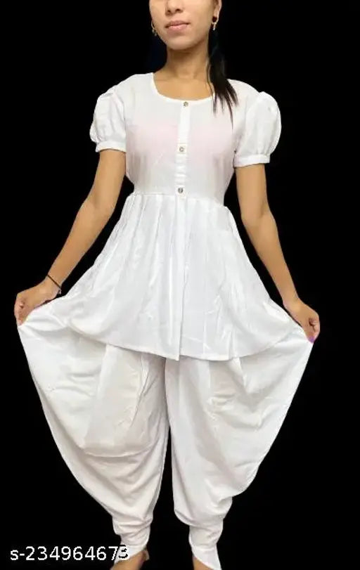 Girls crepe A-line clothing sets with dhoti pants, self-design, short sleeves. Various sizes from 3-16 years. Indian origin