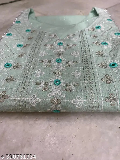 Blue embroidered kurta with a long dupatta, intricate floral patterns, and detailed stitching