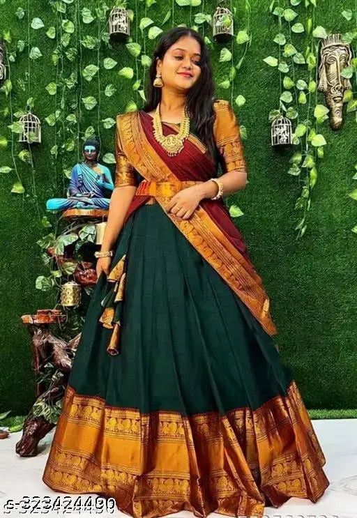 Art Silk South Indian Bridal Girls Lehenga-Choli, unstitched with Zari patterns in solid colors. Shop for various sizes from Shavidr Enterprise