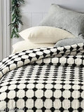 Cotton throw bedcover with black and white checkered pattern