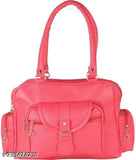 Red leather handbag with multiple pockets and a long strap