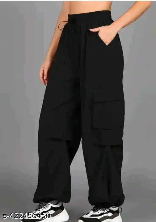 Black jogger with four pockets, featuring multiple cargo pockets for added utility. Comfortable and stylish fabric blend of lycra and grey material. Ideal for casual outfits. Fashion-forward design