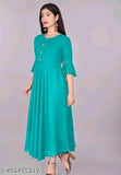 Teal anarkali kameez with three-quarter sleeves, front pleats, and long skirt