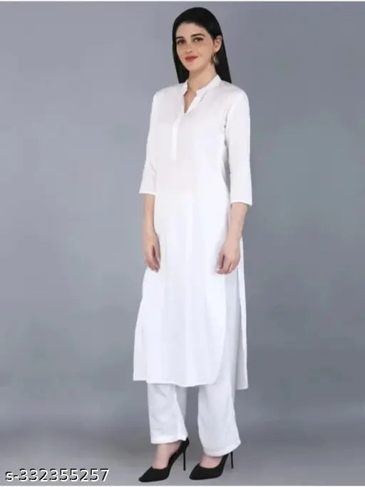 White rayon Kurta with palazzos, three-quarter sleeves, pack of 2, fits M-XXL. Stylish ethnic wear for special occasions. Indian origin