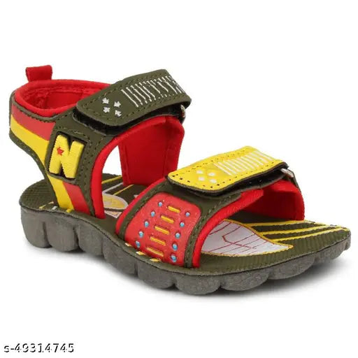 Green and red fabric children's sandals with multiple straps and a Velcro closure