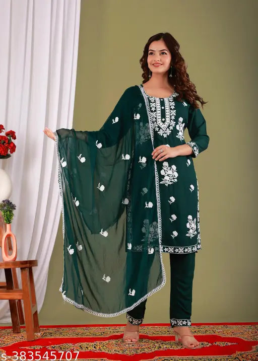Dark green embroidered kameez and churidar set