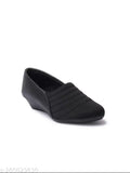 Synthetic black sneakers by Furiozz - Solid design with closed back, offering comfort and style for women