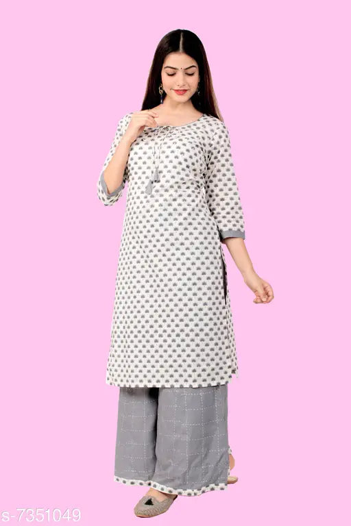 Women's cotton A-line printed long kurti with palazzos, three-quarter sleeves, single piece in various sizes (S, M, L, XL). Indian handcrafted traditional ethnic wear
