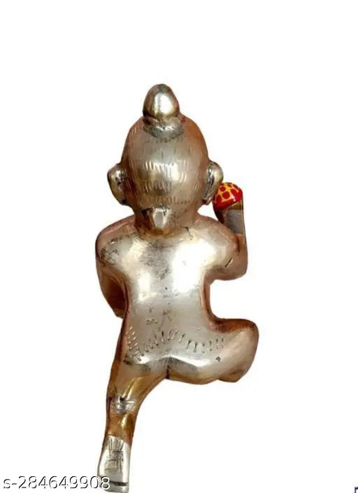 Silver metal Krishna idol, 5 inches, with red tilak, India.