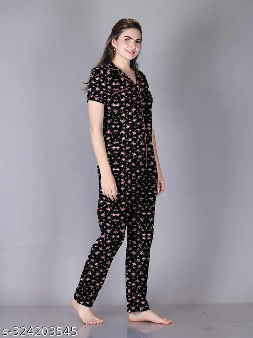 Printed cotton night suit shirt and pyjama set, ultra-soft fabric, elasticized waistband with drawstring, side pocket, perfect fit design for women. Colour lock technology maintains color after washes. Made in India