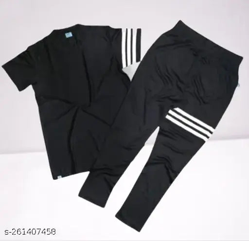 Black solid summer track suit for women's activewear, gymwear, yoga, and sportswear. Made of polyester and spandex for comfort, featuring a full front zipper, side pockets with zippers, and breathable fabric suitable for various occasions and seasons. Indian origin