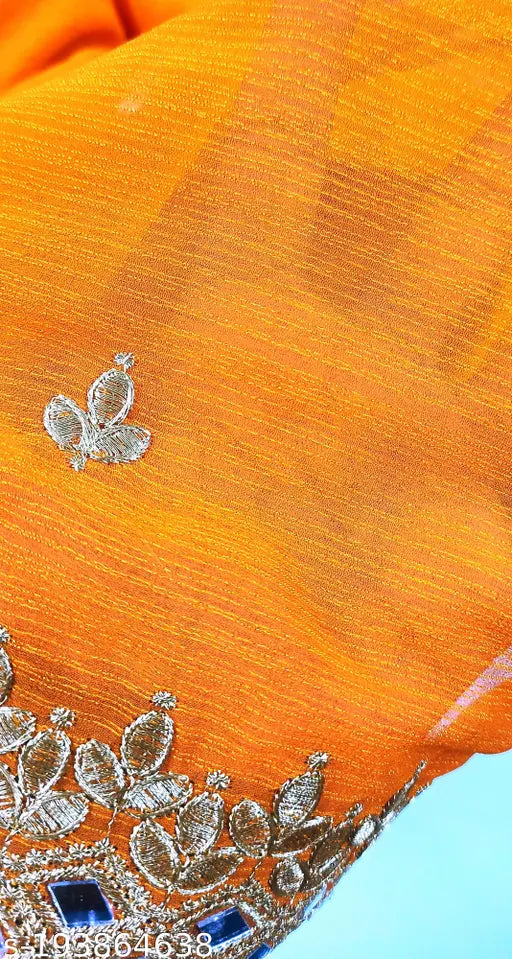 Orange and gold Georgette saree with mirror work