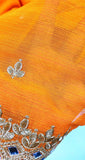 Orange and gold Georgette saree with mirror work