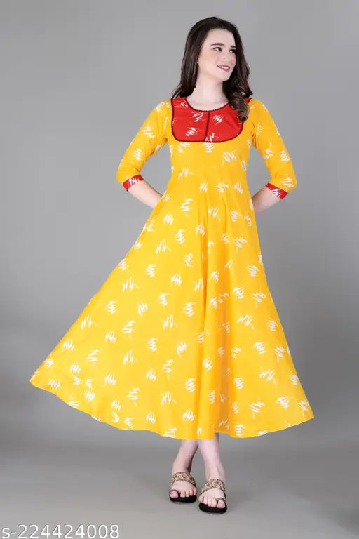 Yellow rayon long flare kameez with pompom design on all sizes