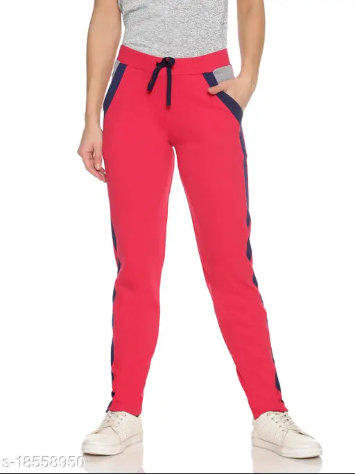 Woman in red track pants, black top