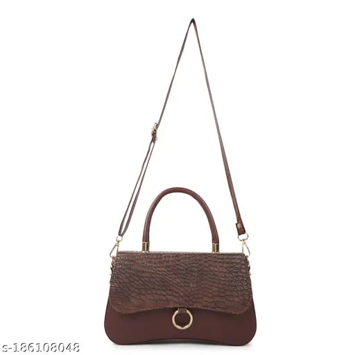 Textured net synthetic handbag, suitable for all occasions. Handbag features 1 main compartment, coin pocket, and mobile compartment with adjustable sider handle, shoulder strap, and hand handle. Women's sling bag from India