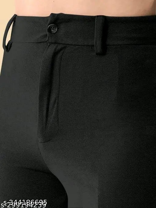 Black, elastic waistband trousers with a zipper closure