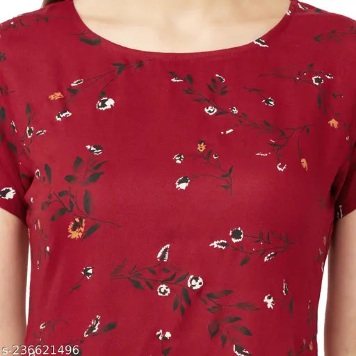 Maroon rayon printed nightsuit, round neck top with short sleeves, detailed with pocket. Comfortable sleepwear from India