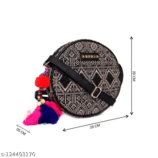 Black lace fabric round sling bag with pompoms