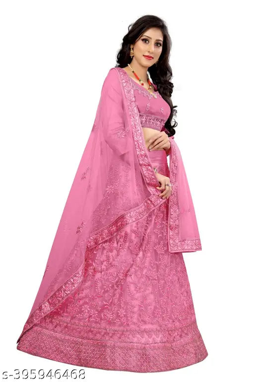 Embroidered Pista-colored Indian wedding lahenga with net, satin, and glitter zari work. Choli and dupatta featuring intricate dori and lace embroidery on free-size net fabric