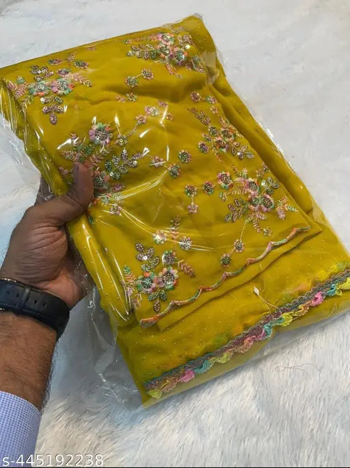Yellow georgette saree with embroidery, blouse included
