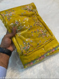 Yellow georgette saree with embroidery, blouse included