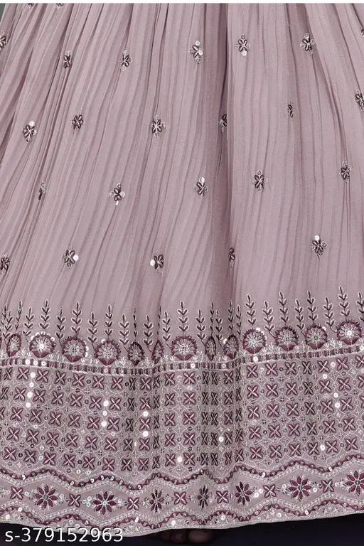 Light purple ethnic gown, embroidered net, three-quarter sleeves. Girls' polyester dress inspired by traditional Indian designs for special occasions." (96 characters)
