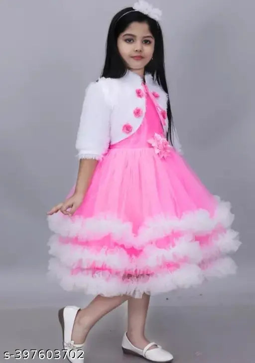 Coral and white net frock with fluffy sleeves and floral appliques, perfect for girls' special occasions (India)