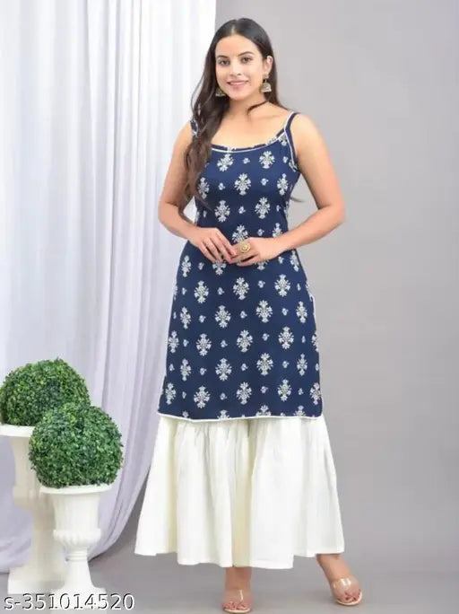 Rayon print net kurta and palazzos set for women, fashionable sleeveless outfit on mannequin