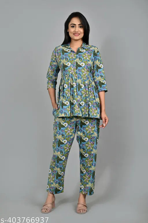 Multi-colored premium cotton printed elegant top & pant coord set, trendy pocket, three-quarter sleeves. Indian-made fashionable sleepwear set for women