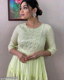 Light green LUREX embroidered flared gown for women. Rayon fabric with three-quarter sleeves. Embroidered pattern, suitable for formal events. Sizes available up to 5XL