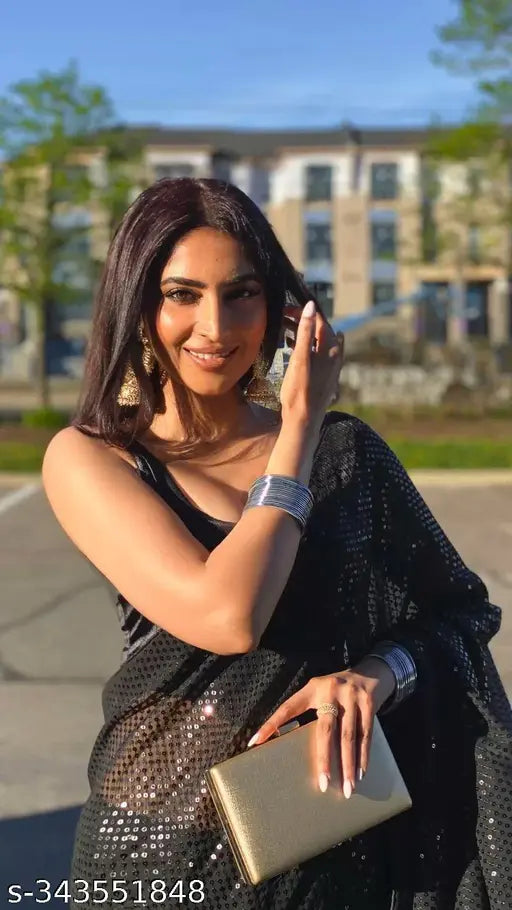 Black sequined saree with silver accents