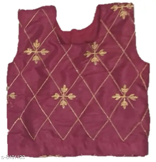 Kids silk blend lehenga choli set, gold and maroon ethnic wear with sleeveless top and embroidered patterns. Close-up view on display stand. Available sizes for 1-2, 3-4, 4-5, 6-7 years old. Made in India