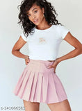 Solid cotton high waist pleated skirt by Caracola Girl, available in multiple sizes from 24-34 inches