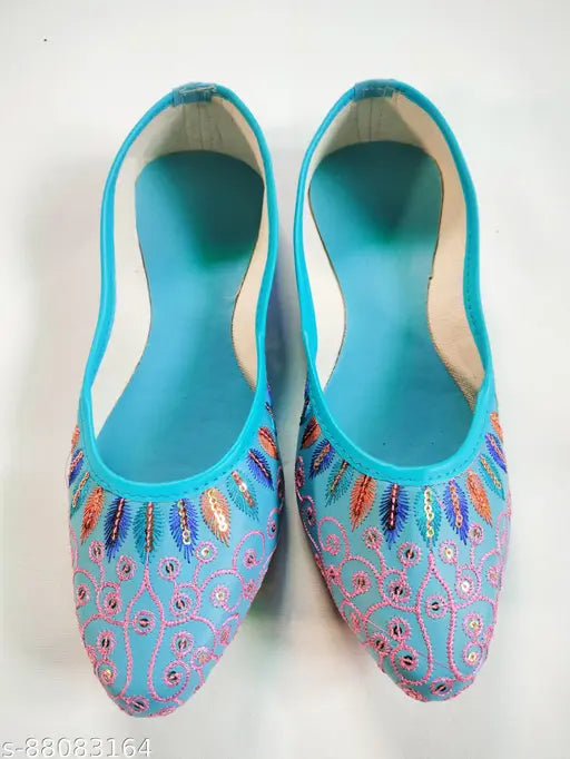 Sky blue synthetic mojaris with embellished pattern, closed back and comfortable fit - Indian footwear