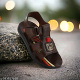 Black sandal with a brown strap and a teddy bear design on the side, suitable for summer, kids' footwear