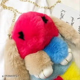 Soft multi-colored sling bag with plush bunny design and multiple pockets