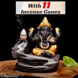 Handcrafted Lord Ganesha idol, backflow cone, brass, wooden table