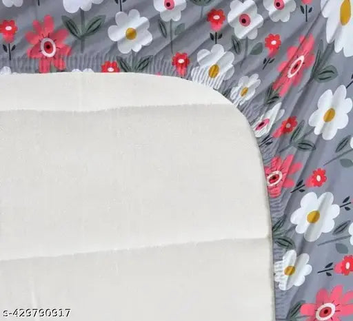 Glace cotton, superfine fitted grey double bedsheet with 2 floral pillow covers, ideal for summer, displayed on a bed