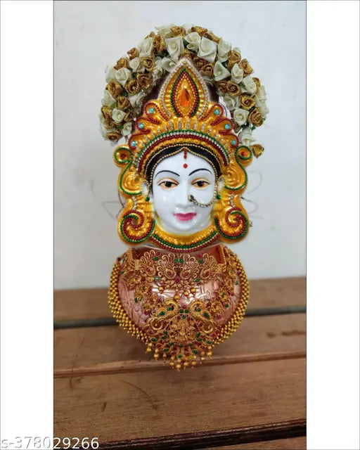 Yellow plastic Mahalakshmi face figurine, Goddess Lakshmi Mukhota for prosperity and wealth