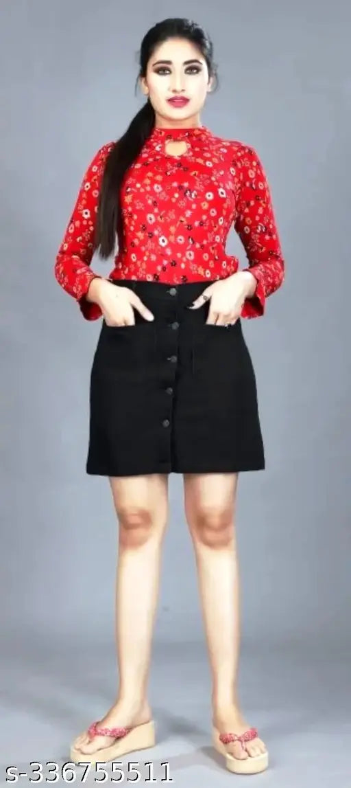 Black denim skirt with straight front pockets and a button-up closure