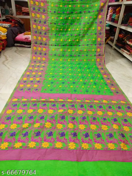 Green and pink handwoven Jamdani saree with floral embroidery